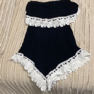 Women tube top romper with white detailed feathers
